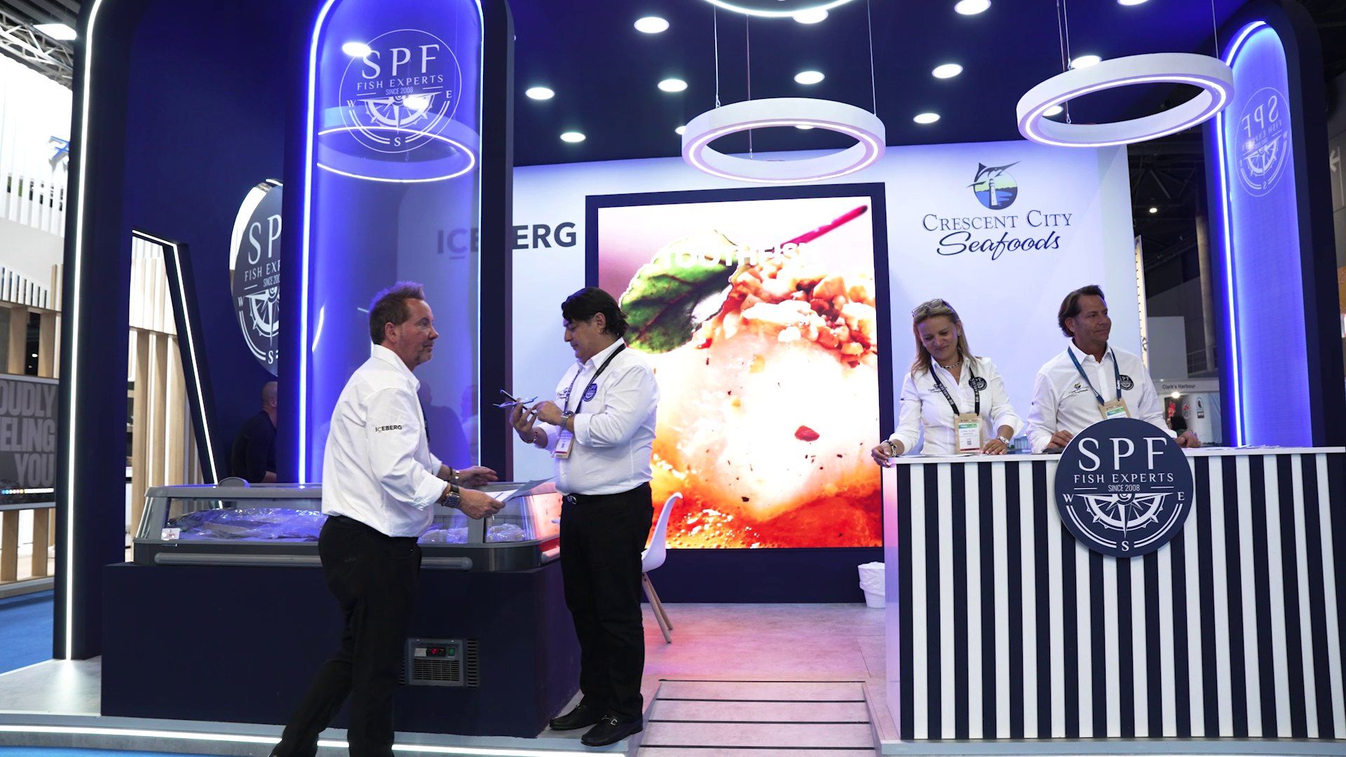Staff and visitors on the SPF Fish Experts stand